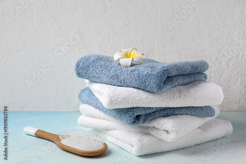 Stack of clean towels, plum...