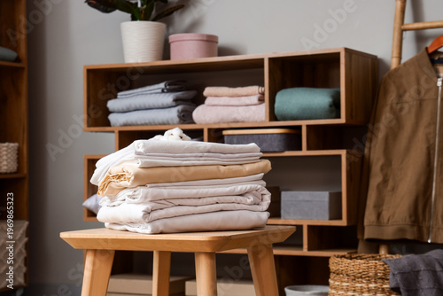 Stack of bed sheets on tabl...
