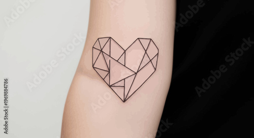 Geometric Heart Tattoo on Arm