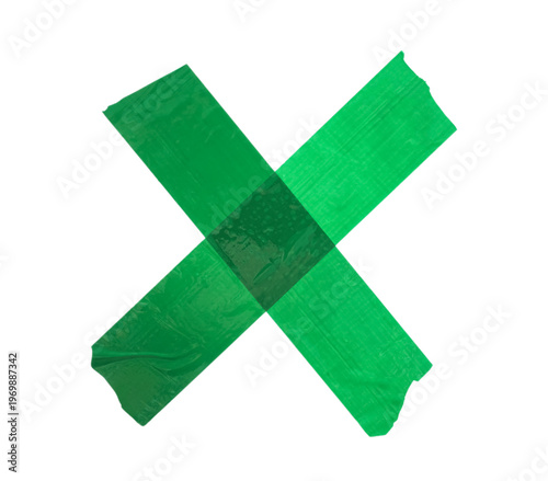 Cross made of green adhesiv...