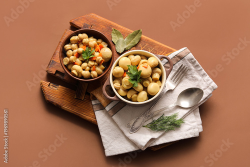 Bowls with tasty canned mus...