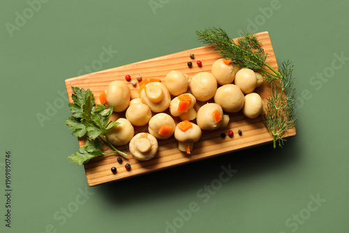 Wooden board with tasty can...