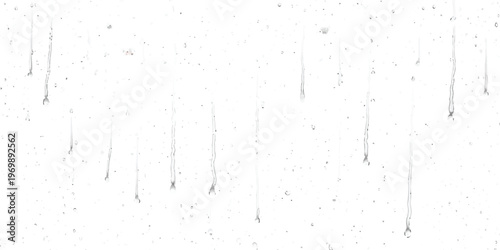 A series of vertical rain streaks running down a glass surface against a bright white background