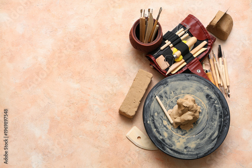 Pottery wheel with clay and...