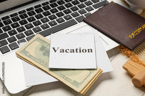 Paper with word VACATION, m...