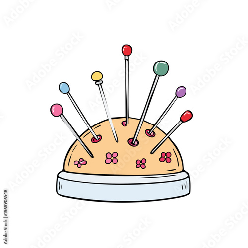 Colorful sewing pins stick out from a pincushion decorated with flowers