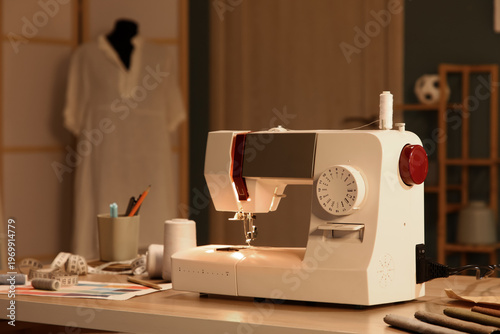 Sewing machine on tailor's ...