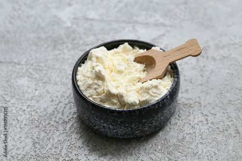 Bowl of powdered milk with ...