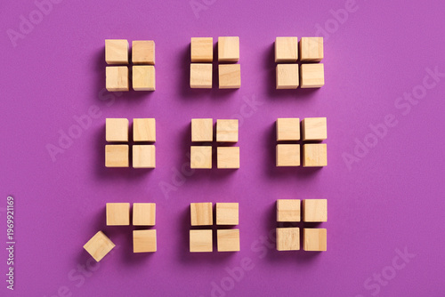 Wooden building cubes on pu...