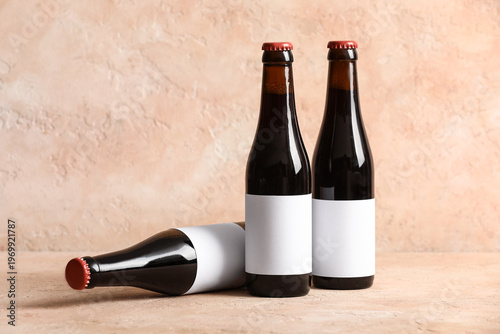 Bottles of cold beer on bei...
