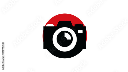 A camera silhouette design. The black camera has a white lens, set in a red circle on a white background