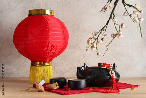 Teapot, cups of tea, fortun...