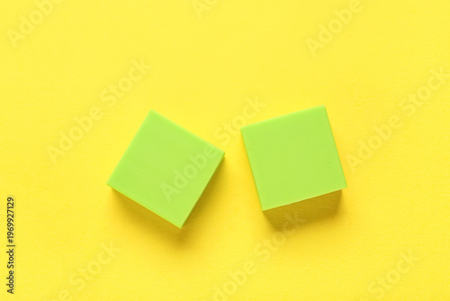Square green rubber erasers...