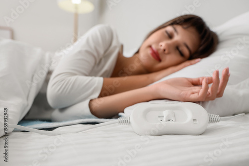 Young woman sleeping on ele...