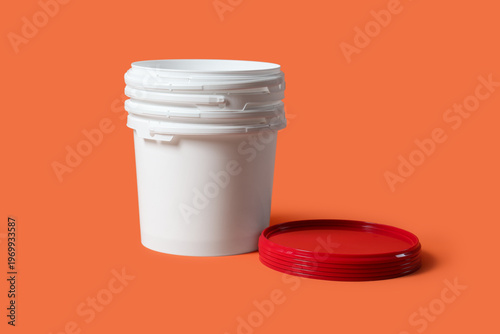 Open plastic paint buckets ...