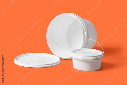 White plastic paint buckets...