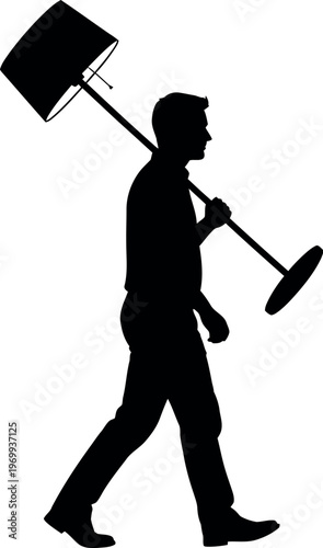 Silhouette of a man walking with a flag on a pole