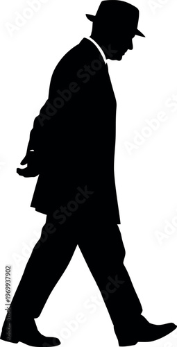 Silhouette of a man walking in a suit and hat