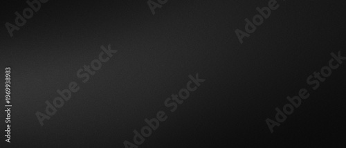 A dark background with a subtle gradient effect  a uniform black color with a slight light reflection on the left side