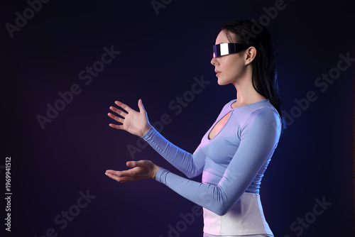 Young woman in futuristic c...