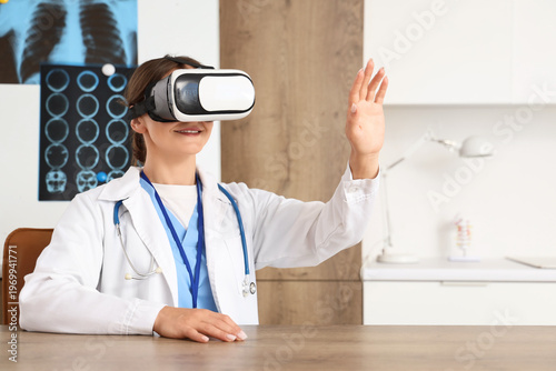 Female doctor in VR glasses...