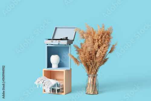 Vinyl record player on cube...