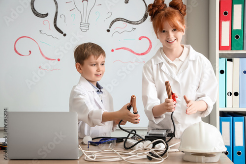 Cute inventors with battery...