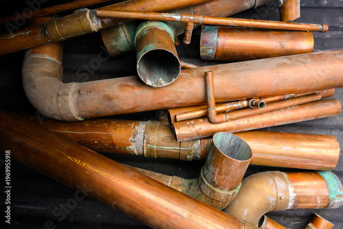 old scrap copper pipe with patina and brass good texture