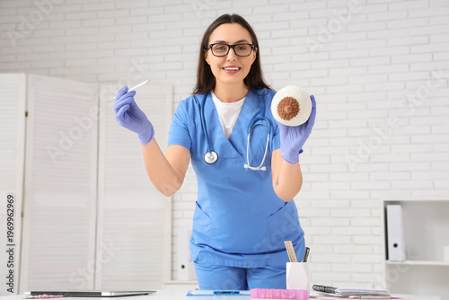 Female doctor with knitted ...