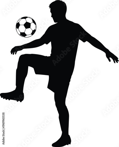 Silhouette of a male soccer player skillfully juggling a ball with his knee and foot