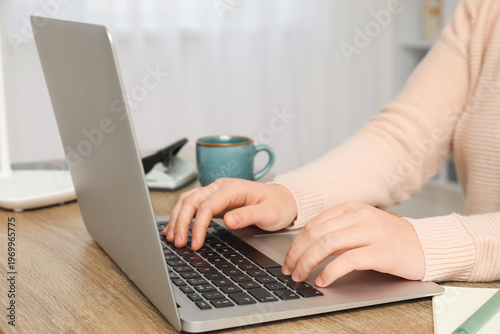 Woman working with modern l...