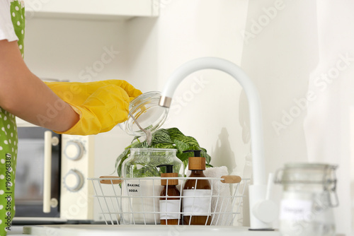 Housewife taking spoon of b...