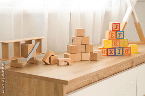 Wooden cubes on commode in ...