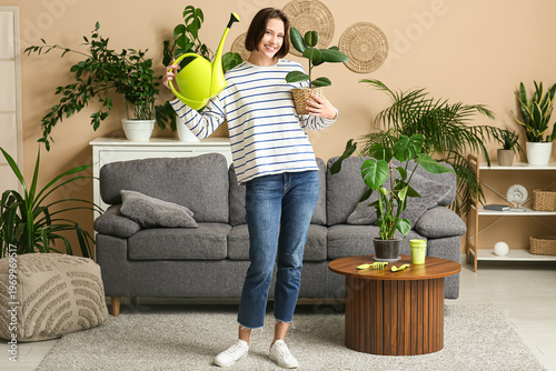 Smiling young woman with ho...