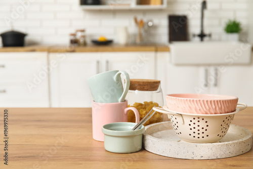 Bowls, cups and colander on...