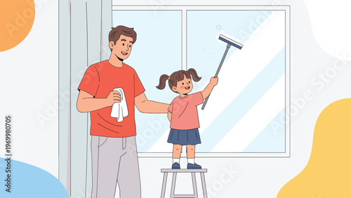 Father helping his little daughter clean the house window with a squeegee while standing on a small wooden stool.