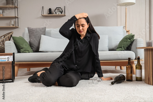 Depressed young woman with ...