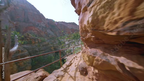 Scenic footage from the popular Canyon Overlook Trail in Zion National Park, Utah. This short, family-friendly hike leads to a stunning viewpoint above the Zion-Mt. Carmel Tunnel, showcasing the majes