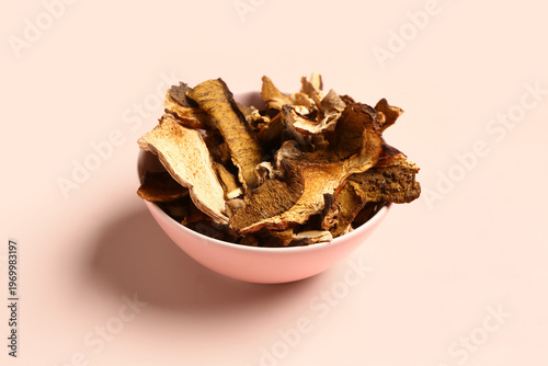 Bowl with tasty dried mushr...