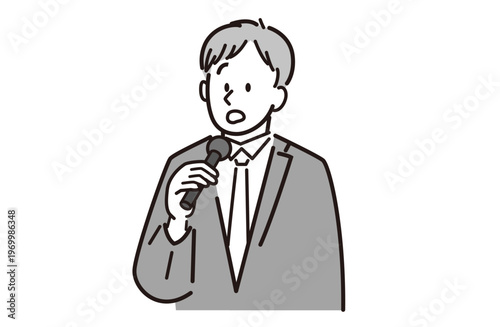 マイクを持って話している男性