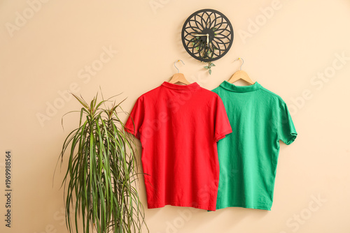 Stylish t-shirts hanging on...