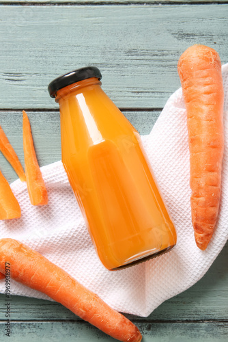 Bottles of fresh carrot jui...