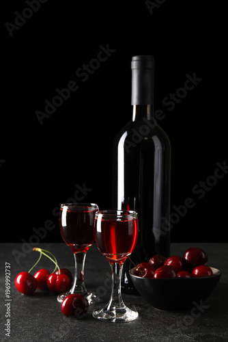 Glasses and bottle with swe...