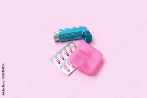 Asthma inhaler and box with...
