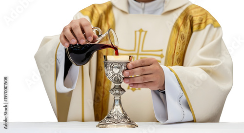 A priest pouring wine into a chalice during a religious ceremony