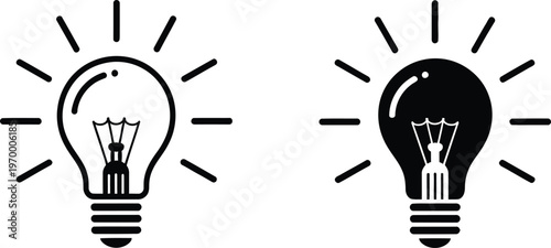 Light bulb with internal filament and radiating lines depicting an idea or inspiration