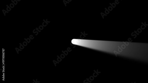Dynamic light beam shining through dark background creating spotlight effect intros transitions and visual effects