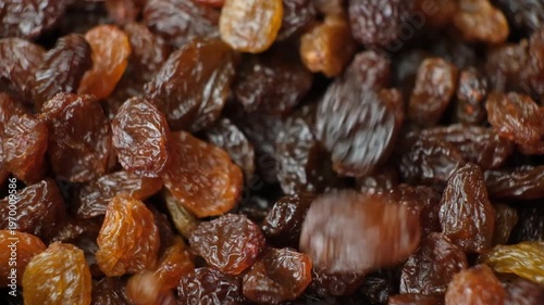 Raisins Pouring in Slow Motion, Close-Up Food Background