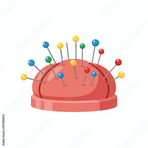 A plump, coral-pink pincushion with a flat, coral base, holding assorted colorful pins