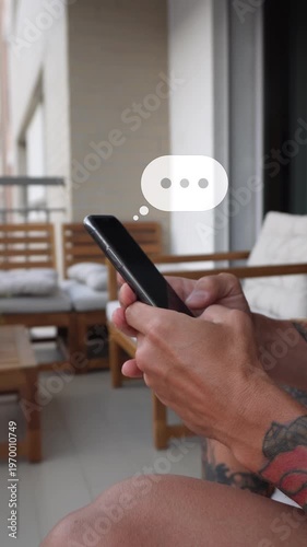 Typing on smartphone with animated chat bubbles overlay. Online messaging concept, close-up hands using mobile phone, social media communication. Vertical video with copy space 9:16.